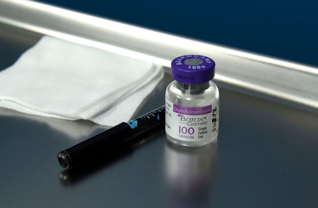 A bottle of Botox sitting on a tray ready for use