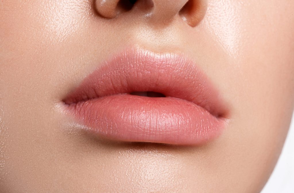 A close up of a woman's plump, full lips