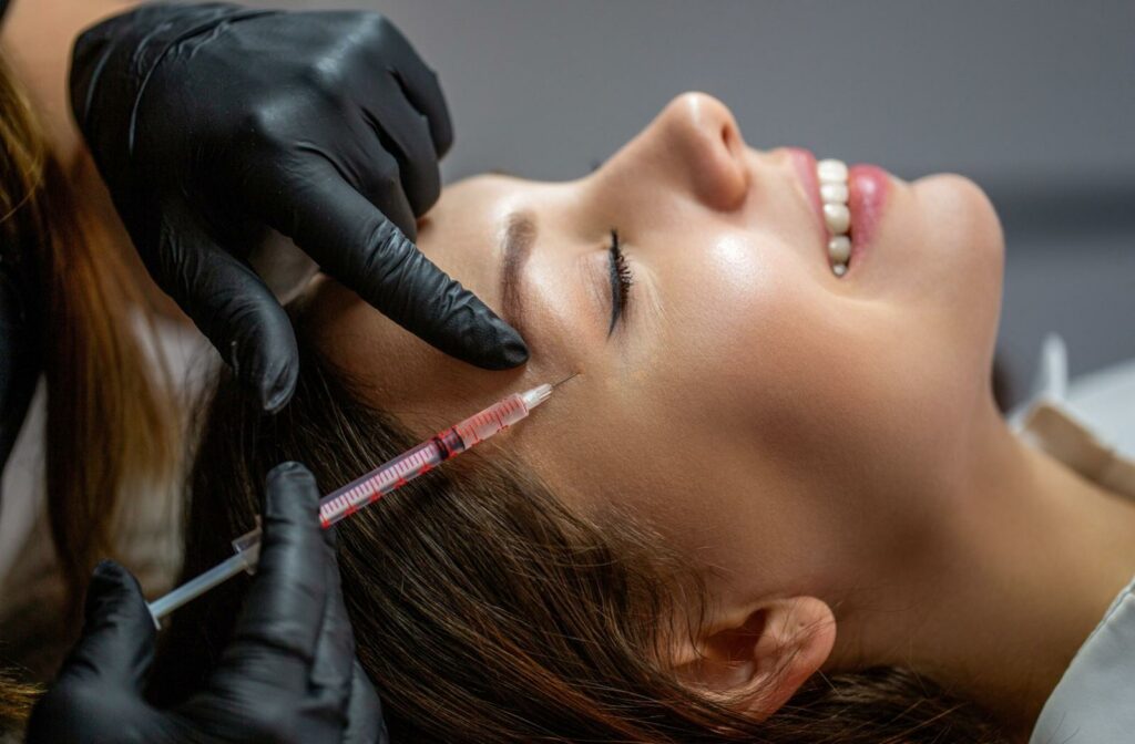 A person getting botox in their face